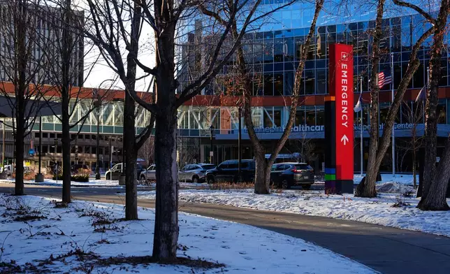 The Hennepin County Medical Center emergency department sign is seen Friday, Jan. 30, 2026, in Minneapolis. (AP Photo/Julia Demaree Nikhinson)