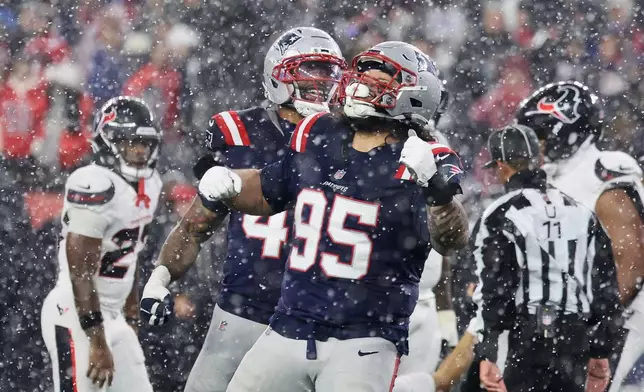 New England Patriots defensive tackle Khyiris Tonga (95) celebrates after sacking Houston Texans quarterback C.J. Stroud during the second half of an NFL divisional playoff football game, Sunday, Jan. 18, 2026, in Foxborough, Mass. (AP Photo/Mark Stockwell)