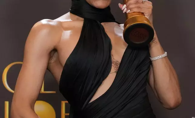 FILE - Teyana Taylor poses for a photo with her best performance by a female actor in a supporting role in any motion picture award for "One Battle After Another" during the 83rd Golden Globes at the Beverly Hilton in Beverly Hills, Calif., Jan. 11, 2026. (AP Photo/Chris Pizzello, File)