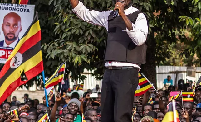 FILE - Uganda opposition presidential candidate Robert Kyagulanyi Ssentamu, known as Bobi Wine, addresses supporters during his final campaign rally in Kampala, Uganda, Jan. 12, 2026. (AP Photo/Samson Otieno, File)