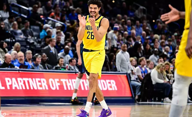 Indiana Pacers guard Ben Sheppard (26) celebrates during the second half of an NBA basketball game against the Oklahoma City Thunder, Friday, Jan. 23, 2026, in Oklahoma City. (AP Photo/Gerald Leong)