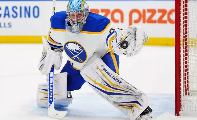 Buffalo Sabres goaltender Colten Ellis (92) makes a save against the Toronto Maple Leafs during the second period of an NHL hockey game in Toronto, Tuesday, Jan. 27, 2026. (Frank Gunn/The Canadian Press via AP)