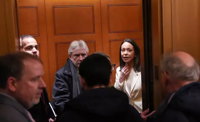 Venezuelan opposition leader María Corina Machado arrives at the Capitol, Thursday, Jan. 15, 2026, in Washington. (AP Photo/Allison Robbert)