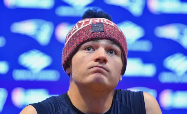 New England Patriots quarterback Drake Maye speaks at a news conference after an NFL divisional playoff football game against the Houston Texans, Sunday, Jan. 18, 2026, in Foxborough, Mass. (AP Photo/Steven Senne)