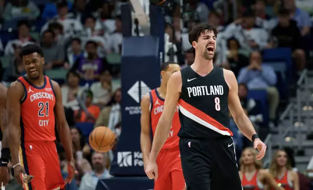 Portland Trail Blazers forward Deni Avdija (8) reacts after being fouled by New Orleans Pelicans guard Bryce McGowens during the first half of an NBA basketball game against the Portland Trail Blazers in New Orleans, Friday, Jan. 2, 2026. (AP Photo/Matthew Hinton)