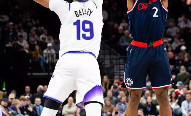 Los Angeles Clippers forward Kawhi Leonard (2) shoots over Utah Jazz forward Ace Bailey (19) during the second half of an NBA basketball game, Tuesday, Jan. 27, 2026, in Salt Lake City. (AP Photo/Anna Fuder)