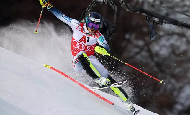Norway's Atle Lie McGrath speeds down the course during an alpine ski, men's World Cup slalom in Kitzbuehel, Austria, Sunday, Jan. 25, 2026. (AP Photo/Marco Trovati)
