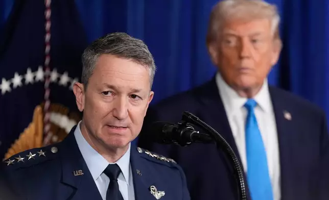 President Donald Trump listens as Chairman of the Joint Chiefs of Staff Gen. Dan Caine speaks at Mar-a-Lago, Saturday, Jan. 3, 2026, in Palm Beach, Fla. (AP Photo/Alex Brandon)