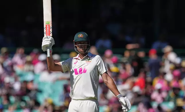 Australia's Beau Webster reacts after scoring 50 runs during play on day four of the fifth and final Ashes cricket test between England and Australia in Sydney, Wednesday, Jan. 7, 2026. (AP Photo/Mark Baker)