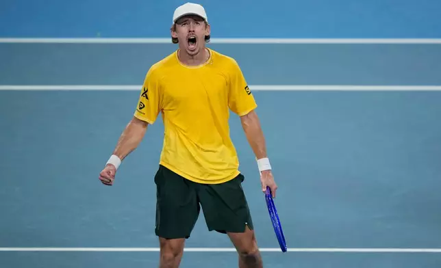 Alex de Minaur of Australia celebrates jis win over Hurkacz of Poland during their quarterfinal match at the United Cup tennis tournament in Sydney, Friday, Jan. 9, 2026. (AP Photo/Rick Rycroft)