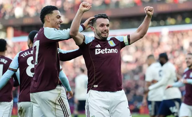 Aston Villa's John McGinn celebrates scoring their side's second goal during their English Premier League soccer match against Nottingham Forest in Birmingham, England, Saturday, Jan. 3, 2026. (Cody Froggatt/PA via AP)