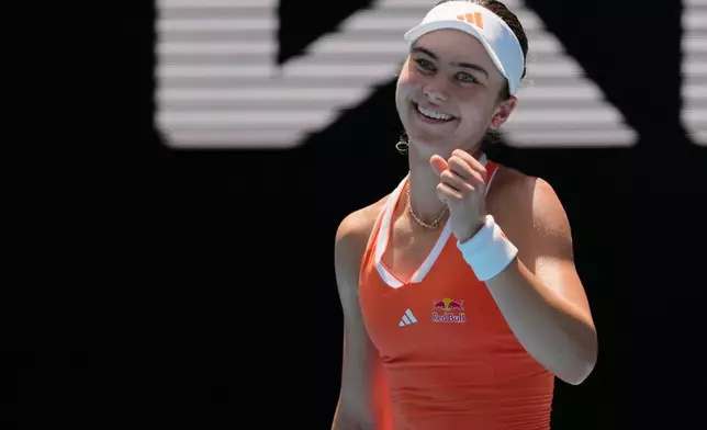 Iva Jovic of the U.S. celebrates after defeating Yulia Putintseva of Kazakhstan in their fourth round match at the Australian Open tennis championship in Melbourne, Australia, Sunday, Jan. 25, 2026. (AP Photo/Aaron Favila)