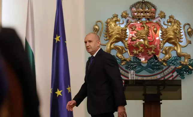 Bulgaria's President Rumen Radev announces that he is stepping down from his position at Bulgarian Presidency, Sofia, Bulgaria, Monday, Jan. 19, 2026. (AP Photo/Valentina Petrova)