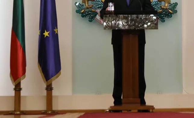 Bulgaria's President Rumen Radev announces that he is stepping down from his position at Bulgarian Presidency, Sofia, Bulgaria, Monday, Jan. 19, 2026 (AP Photo/Valentina Petrova)