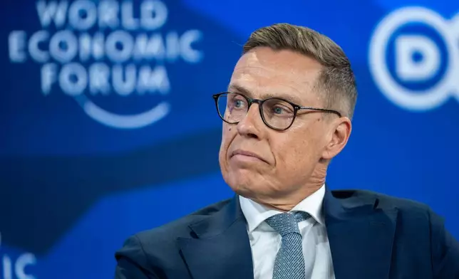 Alexander Stubb, President of Finland, attends a panel discussion during the 56th annual meeting of the World Economic Forum, in Davos, Switzerland, Wednesday, Jan. 21, 2026. (Gian Ehrenzeller/Keystone via AP)