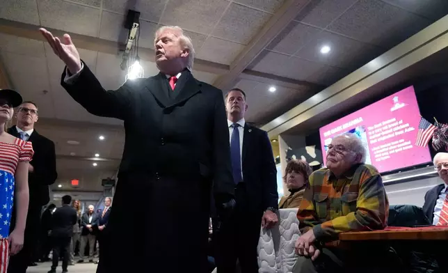 President Donald Trump speaks during a visit to a restaurant in Urbandale, Iowa, Tuesday, Jan. 27, 2026. (AP Photo/Mark Schiefelbein)