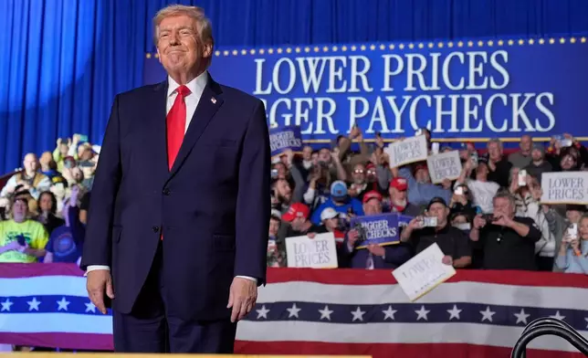 President Donald Trump arrives for an event at the Horizon Events Center in Clive, Iowa, Tuesday, Jan. 27, 2026. (AP Photo/Mark Schiefelbein)