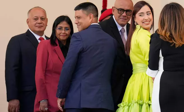 FILE - Venezuelan Interior Minister Diosdado Cabello, from left, Vice President Delcy Rodriguez, National Assembly Vice President Pedro Infante, National Assembly President Jorge Rodriguez and National Assembly Second Vice President America Perez, arrive for the swearing-in ceremony of President Nicolas Maduro for his third term in Caracas, Venezuela, Jan. 10, 2025. (AP Photo/Ariana Cubillos, File)