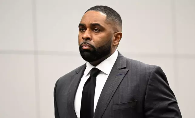 Former Michigan football coach Sherrone Moore appears in the courtroom, Thursday, Jan. 22, 2026, in Ann Arbor, Mich. (AP Photo/Jose Juarez)