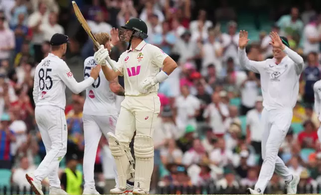 Australia's Marnus Labuschagne reacts after he was dismissed during play on day two of the fifth and final Ashes cricket test between England and Australia in Sydney, Monday, Jan. 5, 2026. (AP Photo/Mark Baker)