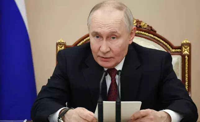 Russian President Vladimir Putin speaks during a meeting on the development of domestic integrated electronics at the Kremlin in Moscow, Thursday, Jan. 22, 2026. (Vyacheslav Prokofyev/Sputnik, Kremlin Pool Photo via AP)