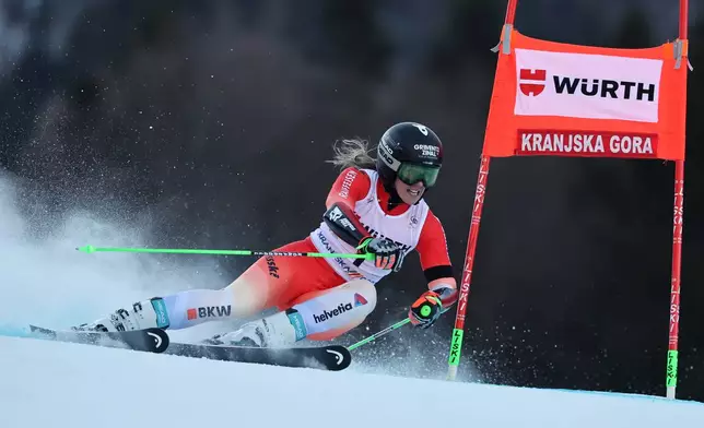 Switzerland's Camille Rast speeds down the course during an alpine ski, women¥s World Cup giant slalom in Kranjska Gora, Slovenia, Saturday, Jan. 3, 2026. (AP Photo/Marco Trovati)