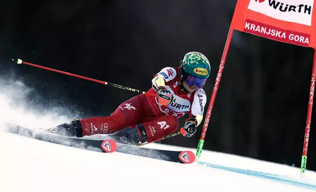 Austria's Julia Scheib speeds down the course during an alpine ski, women's World Cup giant slalom in Kranjska Gora, Slovenia, Saturday, Jan. 3, 2026. (AP Photo/Gabriele Facciotti)