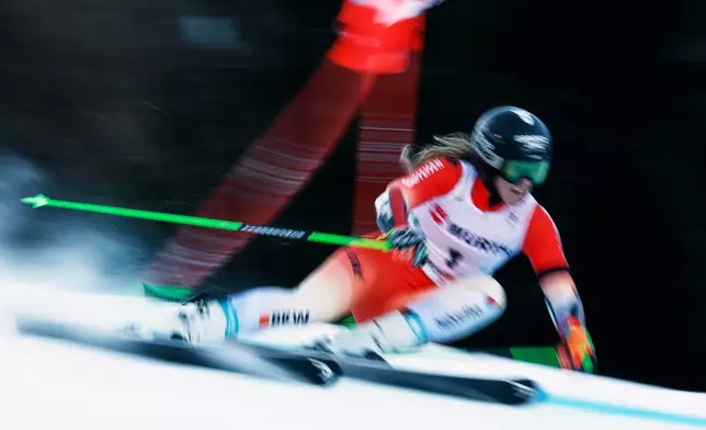 Switzerland's Camille Rast speeds down the course during an alpine ski, women's World Cup giant slalom in Kranjska Gora, Slovenia, Saturday, Jan. 3, 2026. (AP Photo/Gabriele Facciotti)