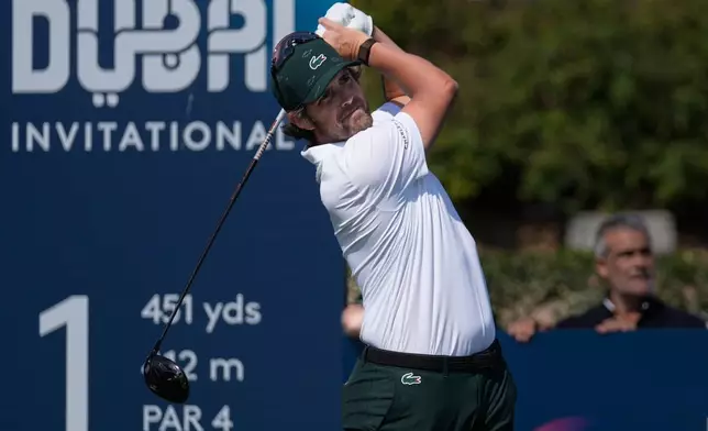 Nacho Elvira of Spain hits off the first tee during the final round of Dubai Invitational golf tournament in Dubai, United Arab Emirates, Sunday, Jan. 18, 2026. (AP Photo/Altaf Qadri)