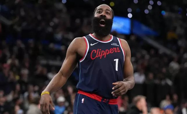 Los Angeles Clippers guard James Harden (1) celebrates his three-point basket during the second half of an NBA basketball game against the Charlotte Hornets Monday, Jan. 12, 2026, in Inglewood, Calif. (AP Photo/Jae C. Hong)