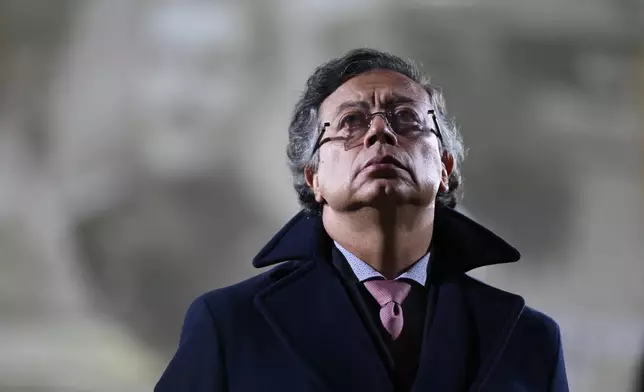 Colombian President Gustavo Petro looks on during a swearing-in ceremony for new military commanders at the army academy in Bogota, Colombia, Monday, Dec. 29, 2025. (AP Photo/Esteban Vega)