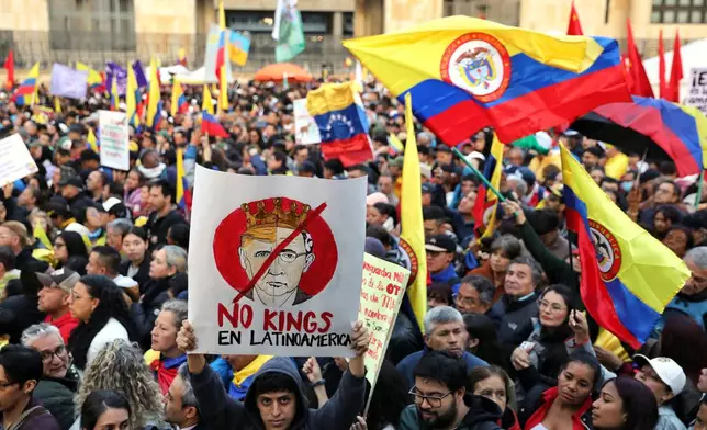 Supporters of Colombian President Gustavo Petro attend a rally he called to protest comments by U.S. President Donald Trump, in Bogota, Colombia, Wednesday, Jan. 7, 2026. (AP Photo/Santiago Saldarriaga)