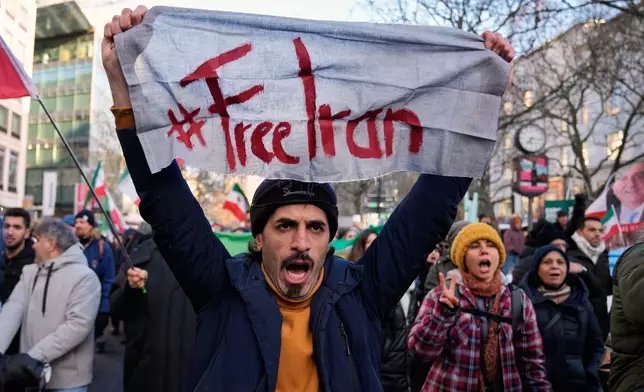FILE - Protesters participate in a demonstration in Berlin, Germany, in support of the nationwide mass protests in Iran against the government, Jan. 10, 2026. (AP Photo/Ebrahim Noroozi, File)