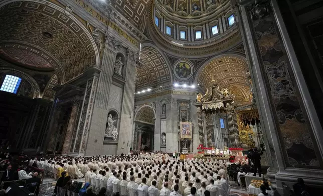 Pope Leo XIV celebrates Mass on the Day of the Epiphany of the Lord inside St. Peter's Basilica at the Vatican, Tuesday, Jan. 6, 2026. (AP Photo/Alessandra Tarantino)