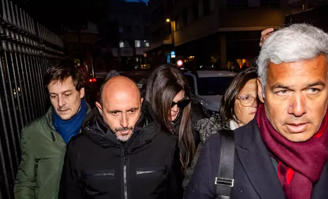 The owners of the "Le Constellation" bar in Crans-Montana, where the deadly fire happened on New Year's Day, Jacques und Jessica Moretti from France, center, arrive with their lawyers Patrick Michod, Yael Hayat and Nicola Meier, to be auditioned by the Valais public prosecutor's office in Sion, Switzerland, Friday, January 9, 2026. (Jean-Christophe Bott/Keystone via AP)