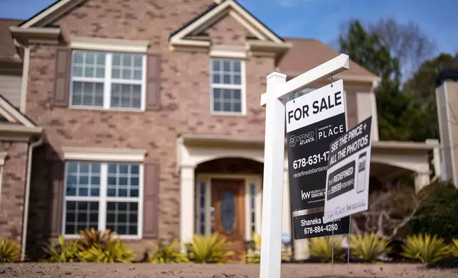 FILE - A "For Sale" sign is displayed outside a home, Feb. 1, 2024, in Aceworth, Ga. (AP Photo/Mike Stewart, File)