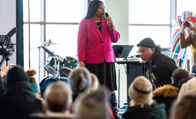 Nekima Levy Armstrong speaks at an anti-ICE rally for Martin Luther King Jr., Monday, Jan. 19, 2026, in St. Paul, Minn. (AP Photo/Angelina Katsanis)