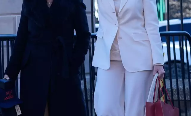 Venezuelan opposition leader María Corina Machado waves to supporters on Pennsylvania Avenue as she leaves the White House after meeting with President Donald Trump Thursday, Jan. 15, 2026, in Washington. (AP Photo/Pablo Martinez Monsivais)