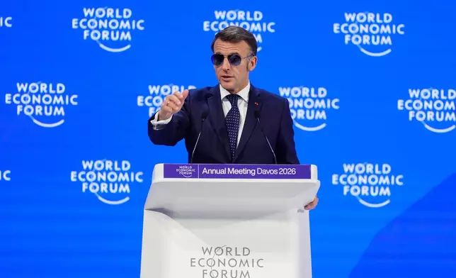 French President Emmanuel Macron speaks during the Annual Meeting of the World Economic Forum in Davos, Switzerland, Tuesday, Jan. 20, 2026. (AP Photo/Markus Schreiber)