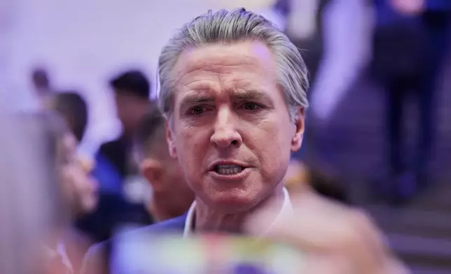 California Governor Gavin Newsom is seen during the Annual Meeting of the World Economic Forum in Davos, Switzerland, Tuesday, Jan. 20, 2026. (AP Photo/Markus Schreiber)