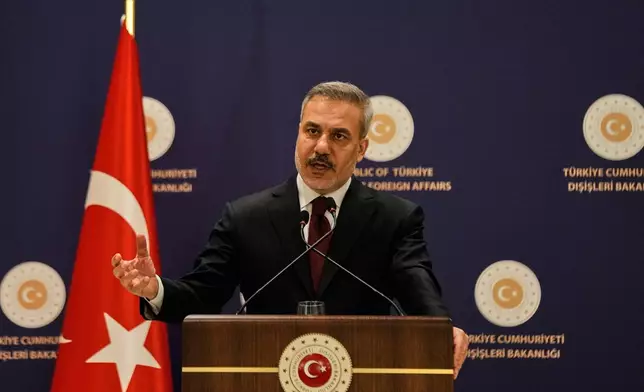 FILE - Turkey's Foreign Minister Hakan Fidan answers questions from reporters during a news conference in Istanbul, Turkey, Thursday, Jan. 15, 2026. (AP Photo/Khalil Hamra, File)