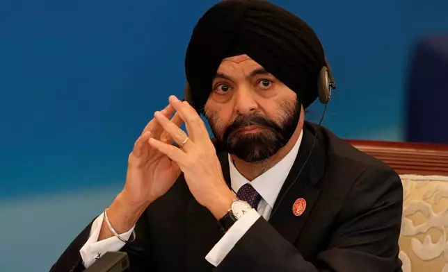 FILE - President of the World Bank Ajay Banga attends the 1+10 Dialogue between Chinese Premier Li Qiang and with heads of major international economic organizations in Beijing, China, Tuesday, Dec. 9, 2025. (AP Photo/Ng Han Guan, File)