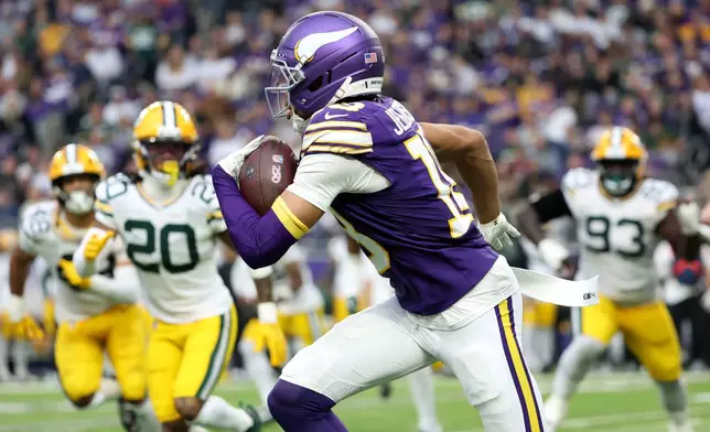 Minnesota Vikings wide receiver Justin Jefferson (18) runs up field during the second half of an NFL football game against the Green Bay Packers, Sunday, Jan. 4, 2026, in Minneapolis. (AP Photo/Ellen Schmidt)