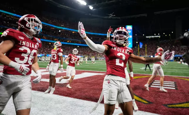 Indiana wide receiver Makai Jackson (2) celebrates a touchdown during the second half of the Peach Bowl NCAA college football playoff semifinal against Oregon, Friday, Jan. 9, 2026, in Atlanta. (AP Photo/Mike Stewart)