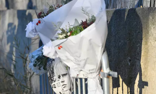 Flowers lay at actor Brigitte Bardot's home in Saint-Tropez, southern France, Sunday, Dec. 28, 2025 after the French 1960s sex symbol who became one of the greatest screen sirens of the 20th century and later a militant animal rights activist and far-right supporter, has died. She was 91. (AP Photo/Philippe Magoni)