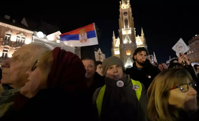 People attend a protest led by university students against corruption, in Novi Sad, Serbia, Saturday, Jan. 17, 2026. (AP Photo/Darko Vojinovic)
