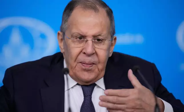 Russian Foreign Minister Sergey Lavrov gestures while speaking during his annual news conference in Moscow, on Tuesday, Jan. 20, 2026. (AP Photo/Pavel Bednyakov)