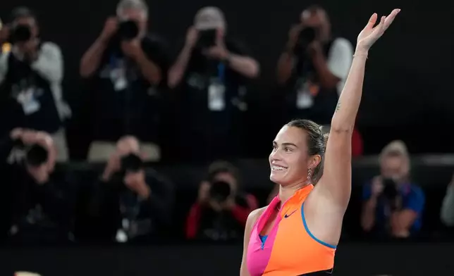 Aryna Sabalenka of Belarus celebrates after defeating Elina Svitolina of Ukraine in their semifinal match at the Australian Open tennis championship in Melbourne, Australia, Thursday, Jan. 29, 2026. (AP Photo/Dar Yasin)