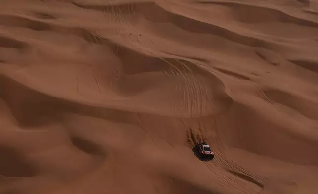 Driver Seth Quintero and co-driver Andrew Short compete during the seventh stage of the Dakar Rally between Riyadh and Wadi Ad Dawasir, Saudi Arabia, Sunday, Jan.11, 2026. (AP Photo/Thibault Camus)