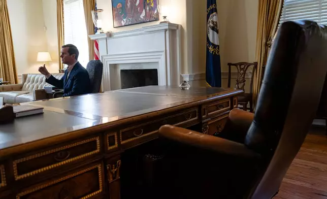 Kentucky Gov. Andy Beshear gives an interview, Monday, Jan. 12, 2026, in Frankfort, Ky. (AP Photo/Jon Cherry)